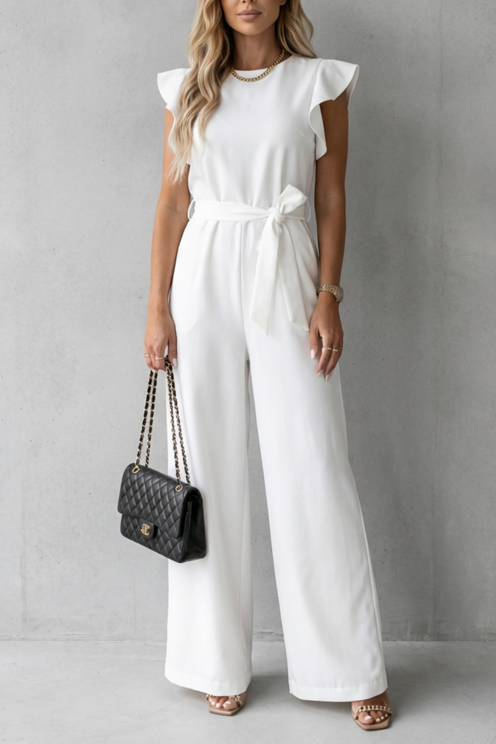Virelle – Ruffle sleeve belted – Wide-leg jumpsuit