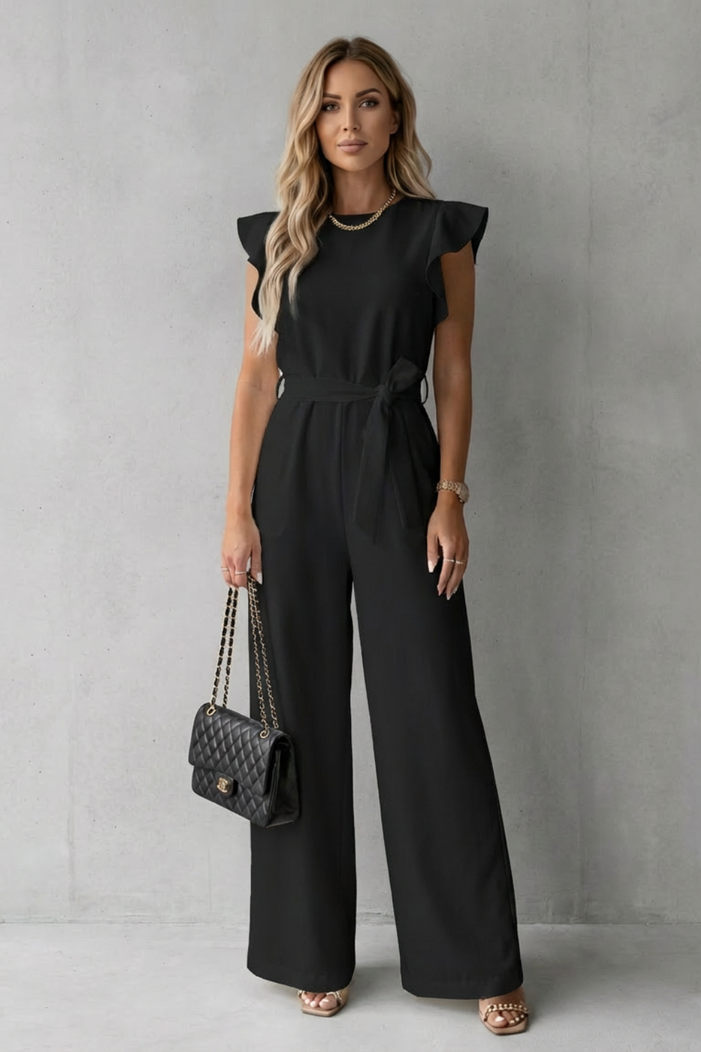 Virelle – Ruffle sleeve belted – Wide-leg jumpsuit