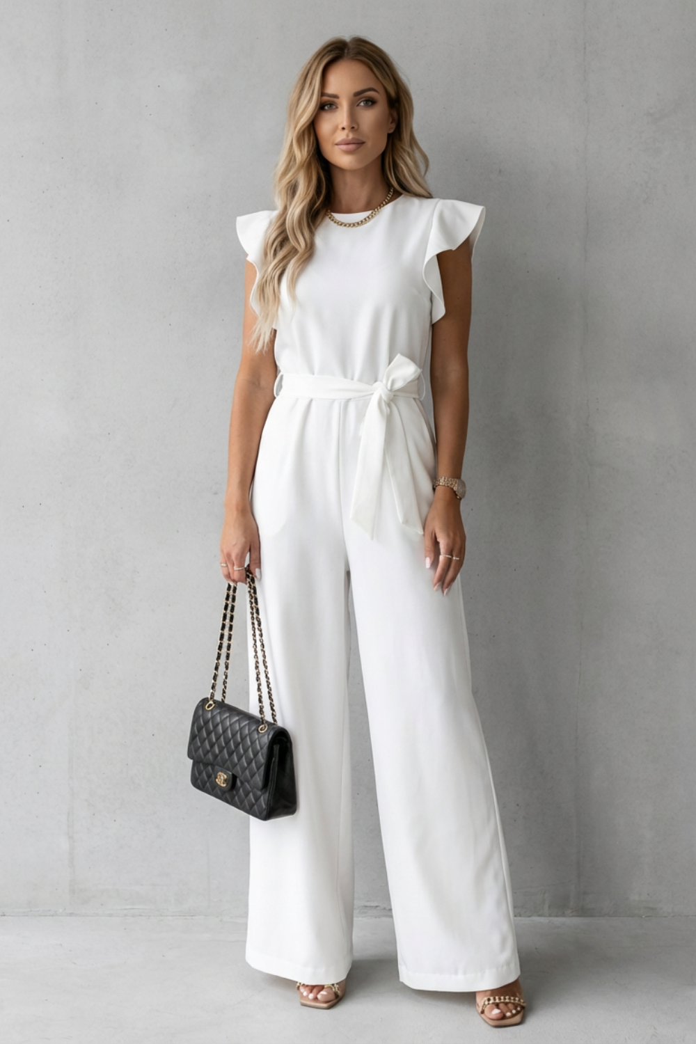 Virelle – Ruffle sleeve belted – Wide-leg jumpsuit