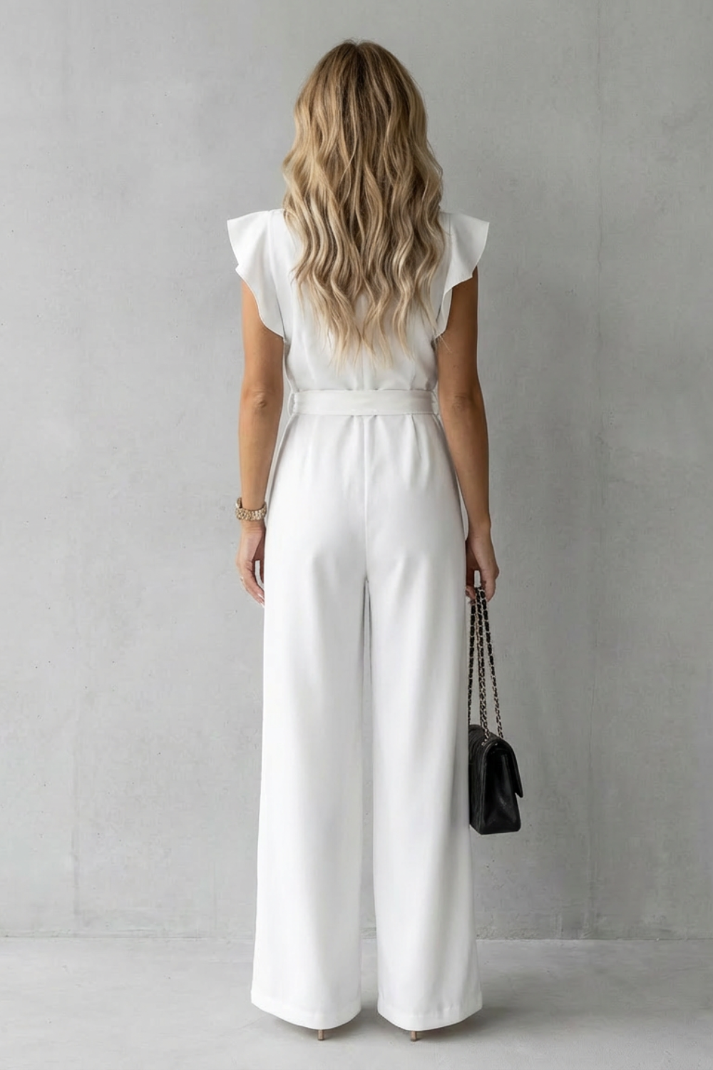 Virelle – Ruffle sleeve belted – Wide-leg jumpsuit