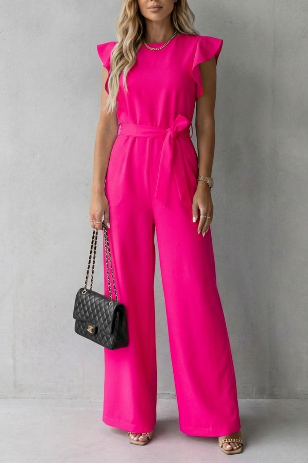 Virelle – Ruffle sleeve belted – Wide-leg jumpsuit