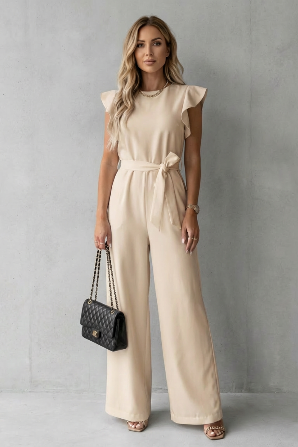 Virelle – Ruffle sleeve belted – Wide-leg jumpsuit